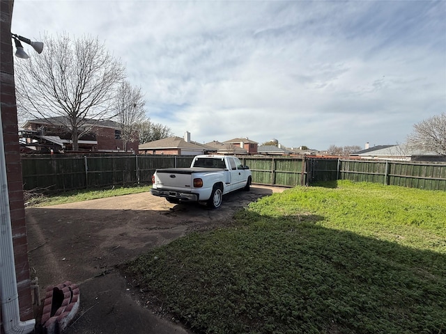 view of yard featuring a fenced backyard