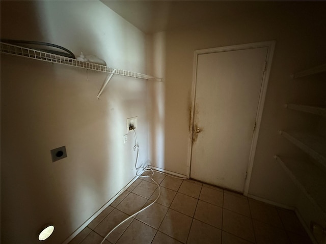 washroom with tile patterned flooring, laundry area, hookup for a washing machine, and electric dryer hookup