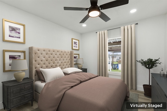 bedroom featuring recessed lighting, a ceiling fan, and wood finished floors