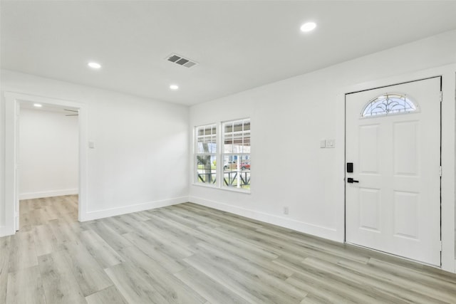 foyer featuring visible vents, recessed lighting, light wood-type flooring, and baseboards