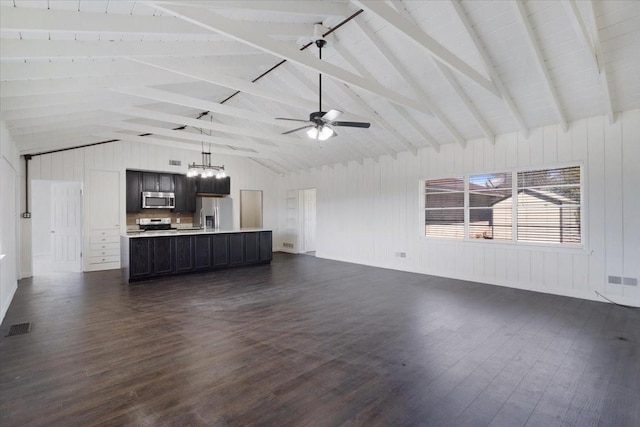 unfurnished living room featuring visible vents, vaulted ceiling with beams, and dark wood-type flooring