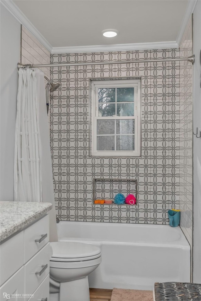 bathroom with vanity, crown molding, toilet, and shower / bathtub combination with curtain