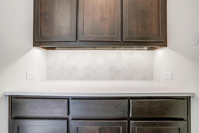 room details featuring decorative backsplash