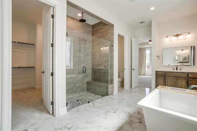 full bath with visible vents, a shower stall, toilet, marble finish floor, and vanity