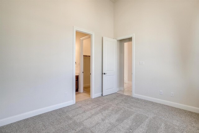 carpeted home theater featuring baseboards