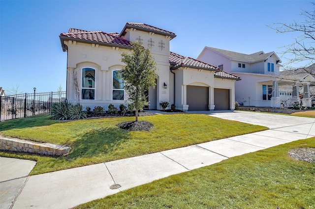 mediterranean / spanish-style home with a tile roof, an attached garage, fence, and stucco siding