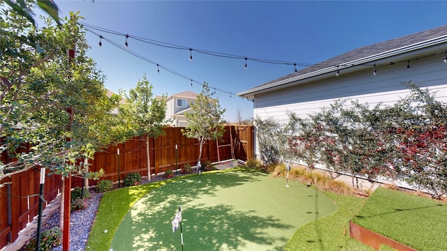 view of yard featuring a fenced backyard