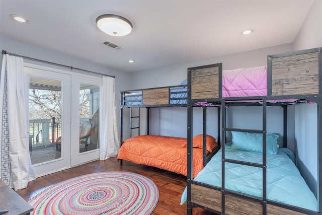 bedroom featuring recessed lighting, visible vents, wood-type flooring, and access to exterior