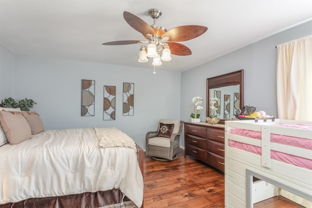 bedroom featuring ceiling fan and wood finished floors