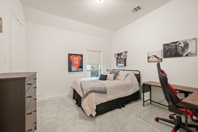 bedroom with light carpet, visible vents, baseboards, and lofted ceiling