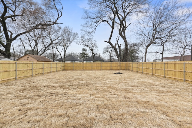 view of yard featuring a fenced backyard