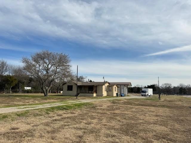 view of front of house with a front lawn