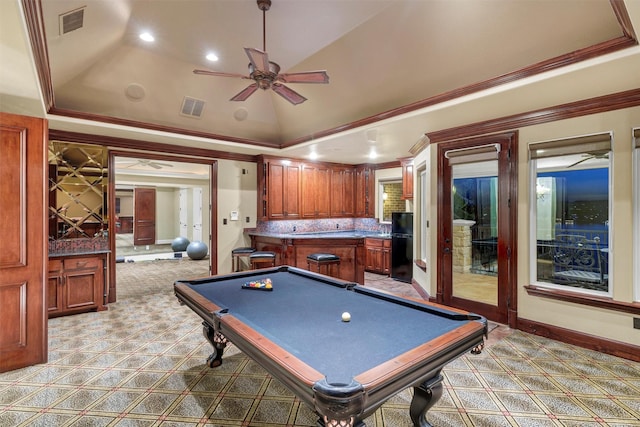 playroom with ceiling fan, lofted ceiling, visible vents, and ornamental molding