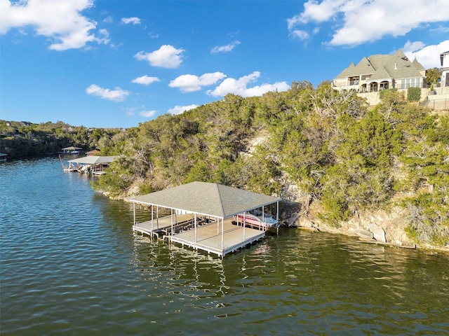 view of dock with a water view and boat lift