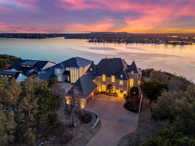 drone / aerial view with a water view