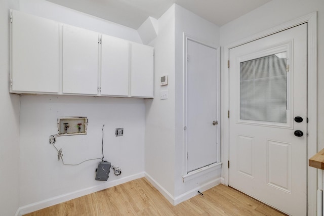 laundry room featuring hookup for a washing machine, baseboards, light wood-style flooring, cabinet space, and electric dryer hookup