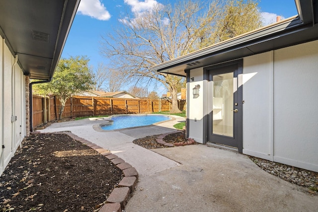 view of patio / terrace featuring a fenced in pool and a fenced backyard