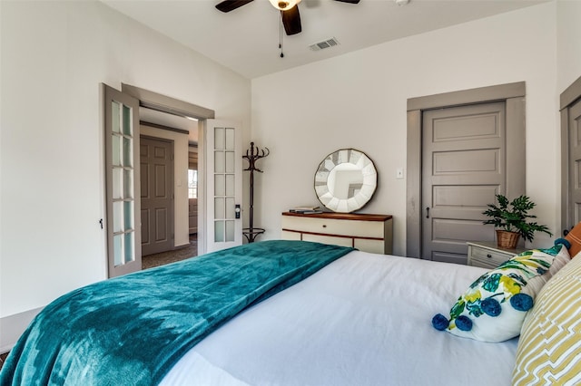 bedroom featuring visible vents, ceiling fan, and french doors