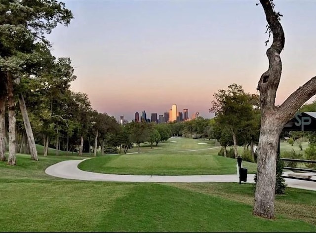 view of property's community featuring a yard