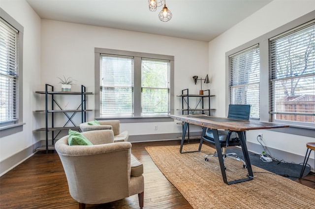 home office with baseboards and dark wood-style flooring