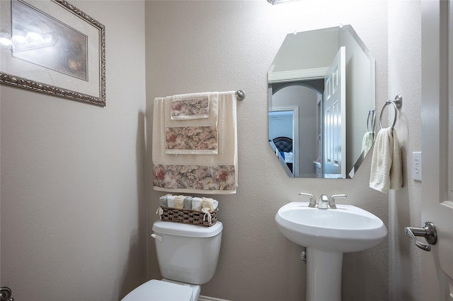 bathroom featuring a sink and toilet