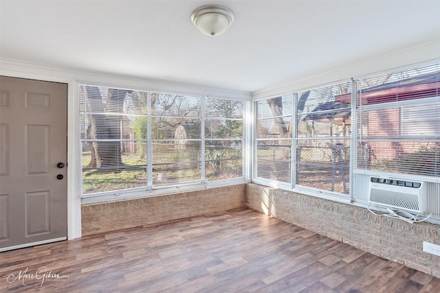 unfurnished sunroom with cooling unit