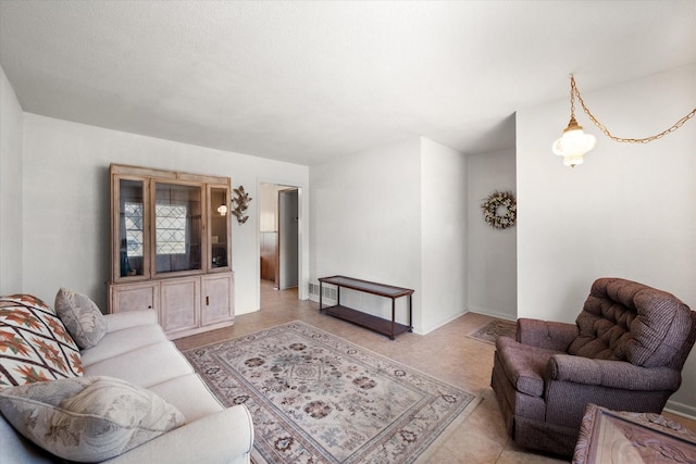 living area with light tile patterned floors