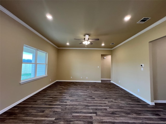 spare room with baseboards, visible vents, and ornamental molding