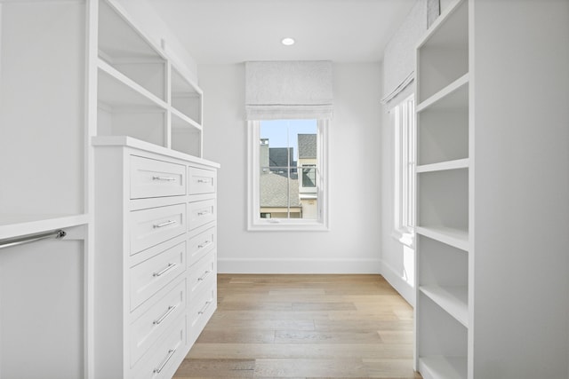 walk in closet featuring light wood-type flooring