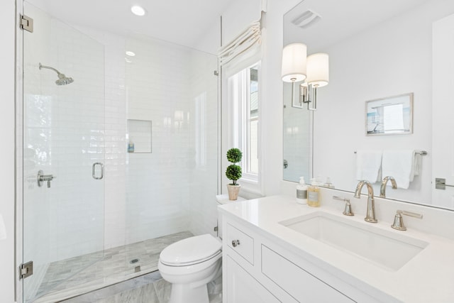 full bathroom with vanity, visible vents, recessed lighting, a stall shower, and toilet