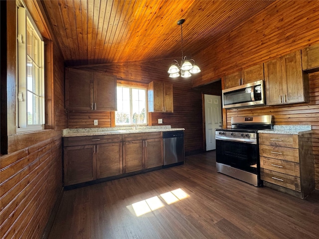 kitchen with wood ceiling, light countertops, lofted ceiling, appliances with stainless steel finishes, and dark wood-style flooring