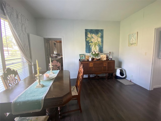 dining area with wood finished floors