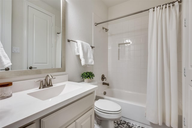 full bathroom featuring vanity, toilet, shower / tub combo, and a textured wall