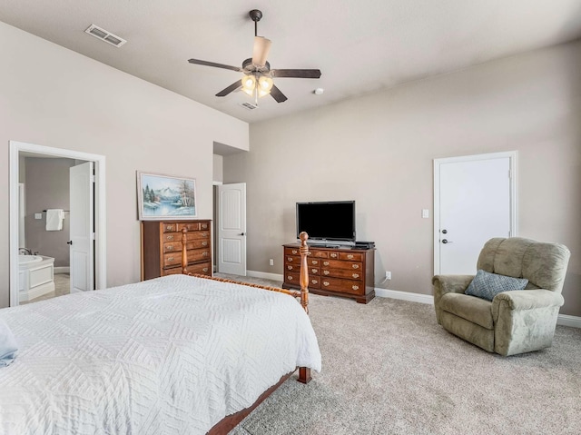 bedroom featuring visible vents, baseboards, light colored carpet, and a ceiling fan