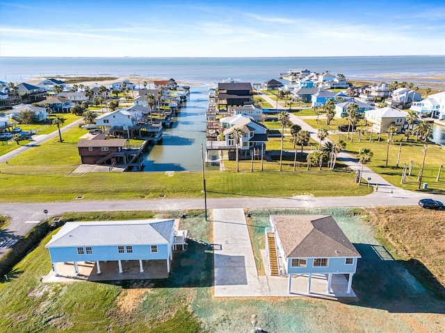 aerial view featuring a water view and a residential view