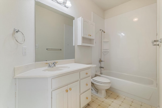 full bathroom with vanity, tile patterned floors, toilet, and washtub / shower combination