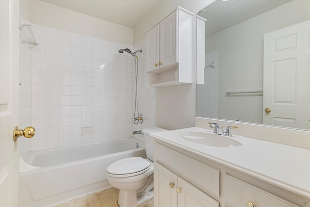 bathroom with vanity, toilet, and shower / bathtub combination