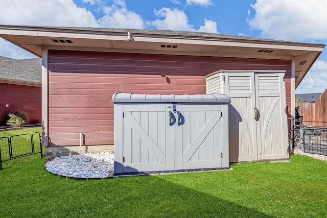 view of outdoor structure featuring fence