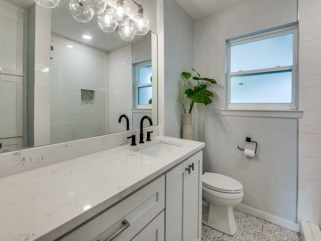 1253 Willow Glen Dr, Dallas, TX 75232 - bathroom featuring walk in shower, a chandelier, tile patterned floors, toilet, and vanity