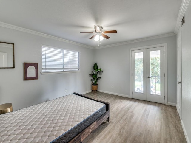 1253 Willow Glen Dr, Dallas, TX 75232 - bedroom featuring french doors, wood finished floors, multiple windows, and access to exterior