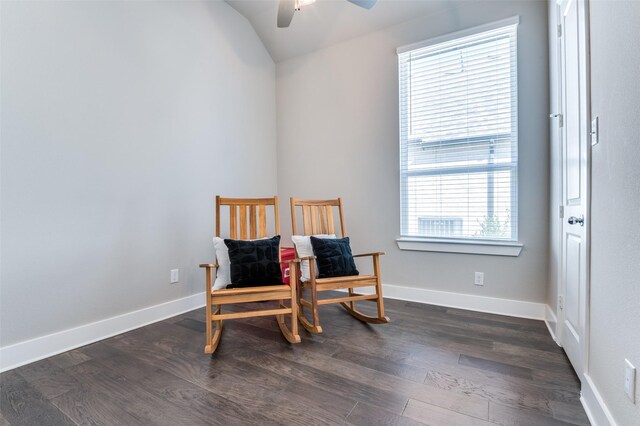 sitting room with lofted ceiling, a ceiling fan, dark wood finished floors, and baseboards