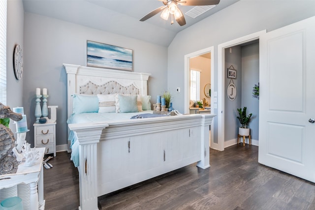 bedroom with dark wood-type flooring, baseboards, lofted ceiling, and ceiling fan