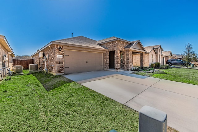 view of front of property featuring an attached garage, central AC, a front lawn, concrete driveway, and brick siding