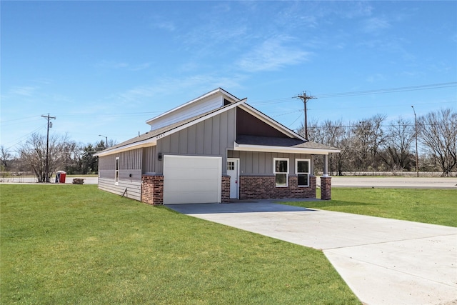 exterior space featuring brick siding, board and batten siding, concrete driveway, and a front yard