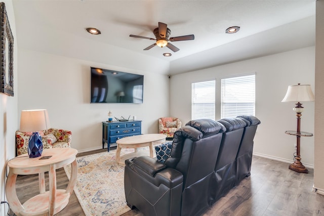 living room featuring recessed lighting, a ceiling fan, baseboards, and wood finished floors