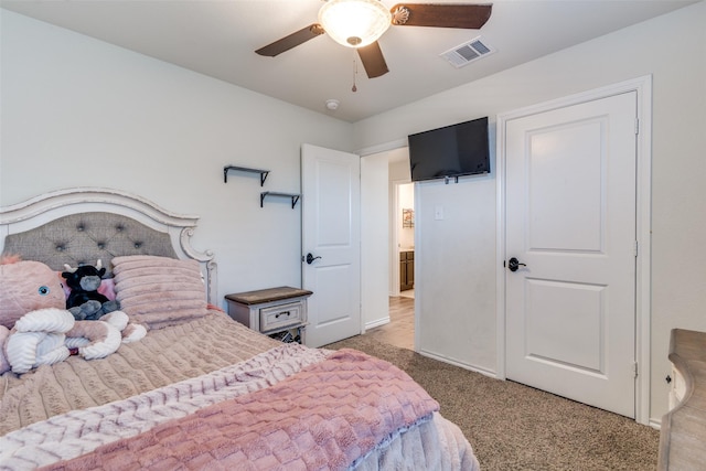 bedroom featuring a ceiling fan, carpet, and visible vents