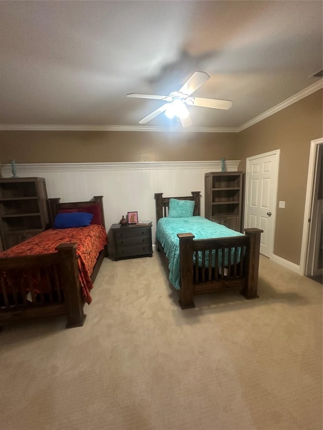 bedroom featuring visible vents, light carpet, ornamental molding, baseboards, and ceiling fan