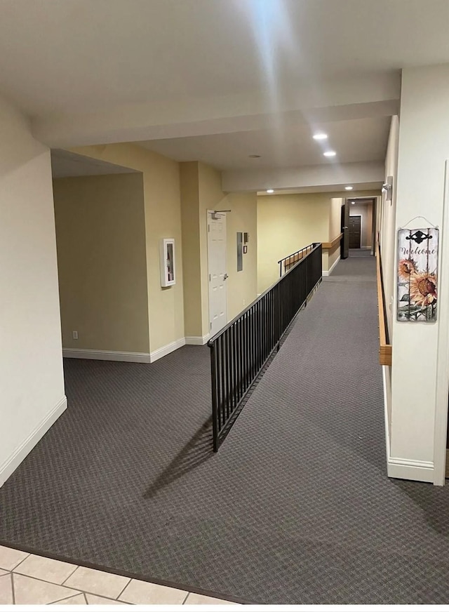 corridor with recessed lighting, baseboards, and carpet