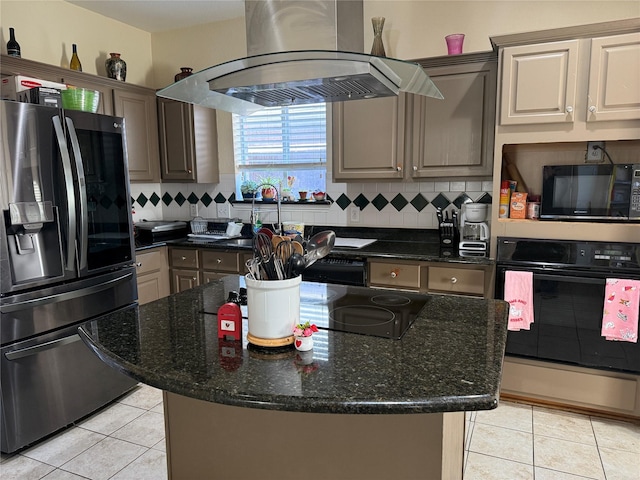 kitchen featuring light tile patterned flooring, decorative backsplash, black appliances, and island range hood