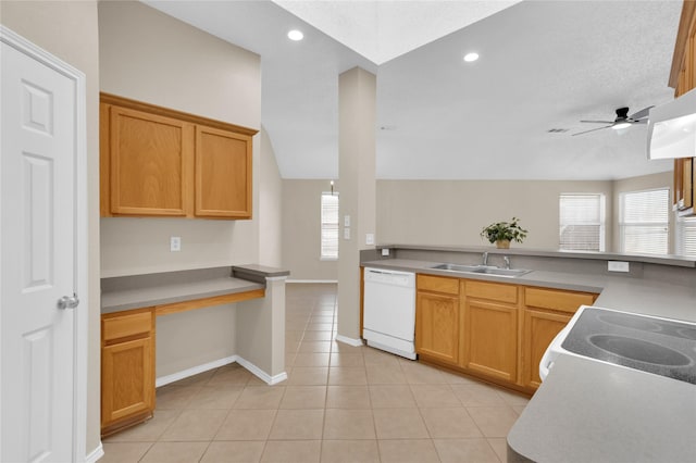 kitchen with white appliances, a healthy amount of sunlight, a ceiling fan, and a sink